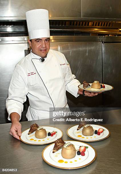 Pastry Chef Juan Sigala holds the dessert that will be served at the 66th Annual Golden Globe Awards at the Beverly Hilton Hotel, on January 6, 2009...