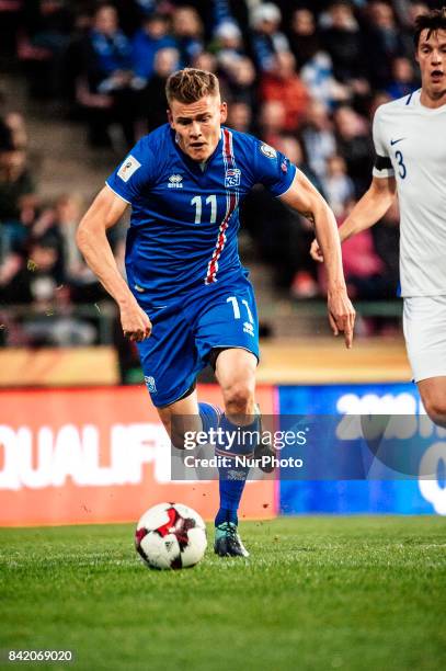 Iceland's Alfred Finnbogason and during the FIFA World Cup 2018 Group I football qualification match between Finland and Iceland in Tampere, Finland,...