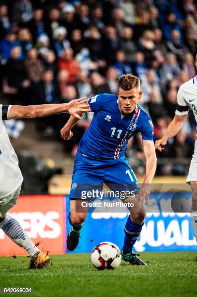 Iceland's Alfred Finnbogason and during the FIFA World Cup 2018 Group I football qualification match between Finland and Iceland in Tampere, Finland,...