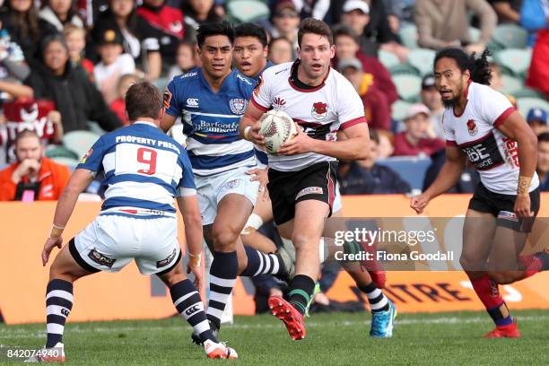 Harrison Groundwater of North Harbour is defended by Jono Hickey of Auckland during the round three Mitre 10 Cup match between North Harbour and...