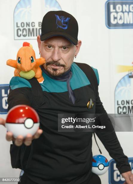 Cosplayer Jim Cartwright dressed as a mashup Starfleet Pokemon trainer attends the 2017 Long Beach Comic Con held at the Long Beach Convention Center...