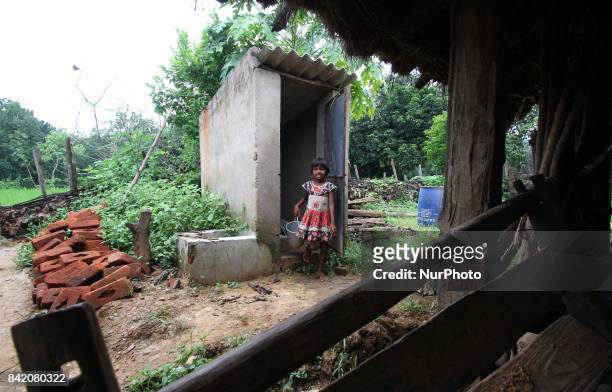 Villagers look along with their well furnished toilets as they are inspired by some local social workers as they are use toilets to make better...
