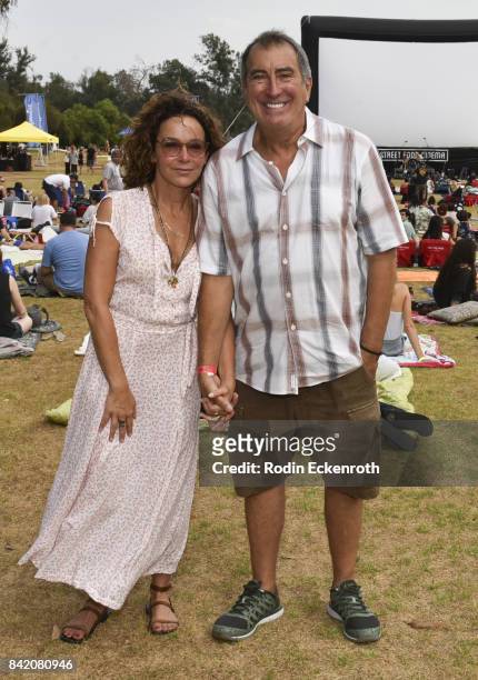 Actress Jennifer Grey and choreographer Kenny Ortega pose for portrait at the special screening of "Dirty Dancing" at Will Rogers State Historic Park...