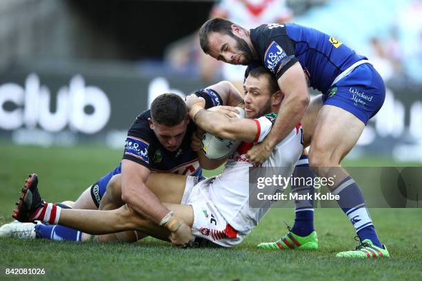 Jason Nightingale of the Dragons is tackled during the round 26 NRL match between the St George Illawarra Dragons and the Canterbury Bulldogs at ANZ...