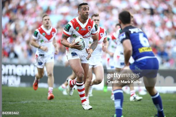 Paul Vaughan of the Dragons runs the ball during the round 26 NRL match between the St George Illawarra Dragons and the Canterbury Bulldogs at ANZ...