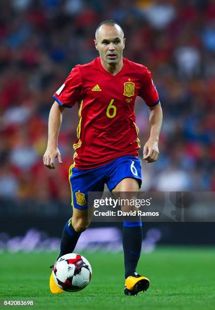 Andres Iniesta of Spain runs with the ball during the FIFA 2018 World Cup Qualifier between Spain and Italy at Estadio Santiago Bernabeu on September...