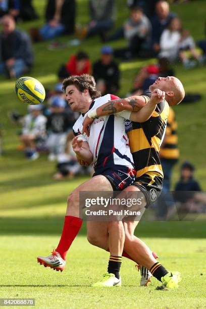 Billy Meakes tackles Jack McGregor of the Rising during the round one NRC match between Perth Spirit and Melbourne Rising at McGillivray Oval on...