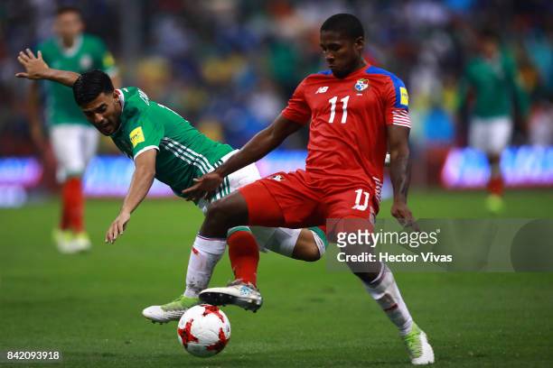 Carlos Vela of Mexico struggles for the ball with Armando Cooper of Panama during the match between Mexico and Panama as part of the FIFA 2018 World...