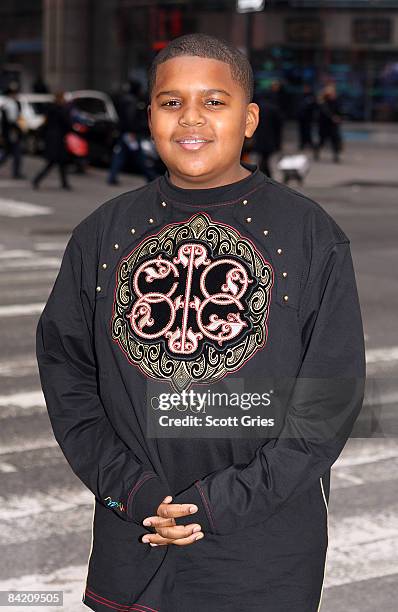 Christopher "The Notorious B.I.G." Wallace's son actor CJ Wallace poses for a photo following ringing the opening bell of the NASDAQ stock market on...