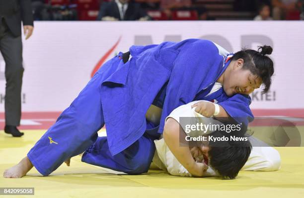 Sara Asahina of Japan and Yu Song of China compete in the women's over-78-kilogram final at the judo world championships in Budapest on Sept. 2,...