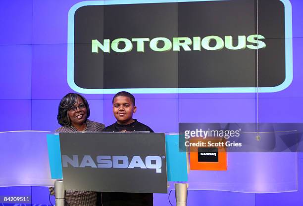 Christopher "The Notorious B.I.G." Wallace's mother Voletta Wallace and his son actor CJ Wallace ring the opening bell of the NASDAQ stock market on...