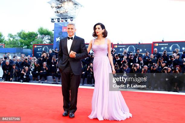 George Clooney and his wife Amal arrive at the 'Suburbicon' premiere during the 74th Venice Film Festival on September 2, 2017 in Venice, Italy....