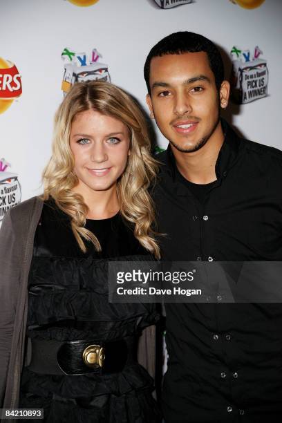 Theo Walcott and Melanie Slade attend the 'Do Us A Flavour' Walkers launch party at Paramount, Centre Point building on January 8, 2009 in London,...