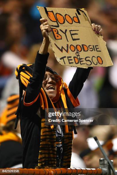 Tigers fan holds up a sign during the round 26 NRL match between the Wests Tigers and the New Zealand Warriors at Leichhardt Oval on September 3,...