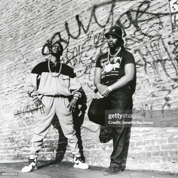 The rap duo Eric B and Rakim pose against a graffiti-scarred wall in New York, 1987.