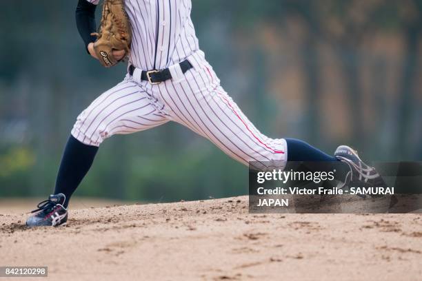 Tsuru Asaka of Japan pitches during the BFA Women's Baseball Asian Cup match between Japan and Chinese Taipei at Sai Tso Wan Recreation Ground on...