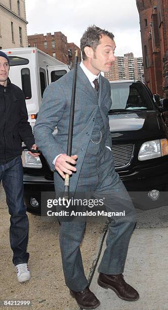 Actor Jude Law walks on the film set of "Sherlock Holmes" on January 8, 2009 in the Brooklyn borough of New York City.