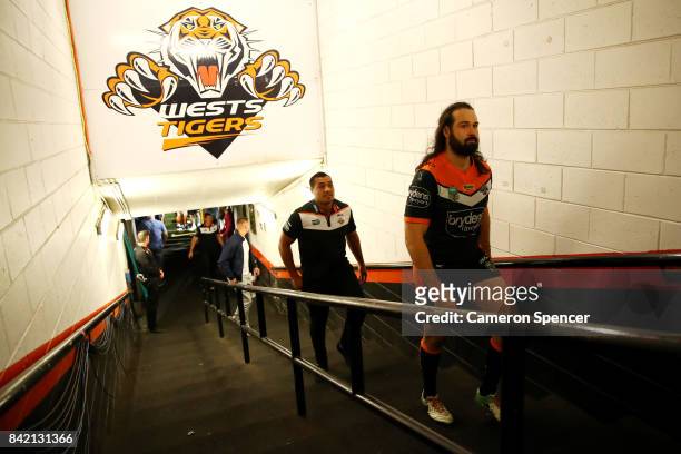 Aaron Woods of the Tigers walks up the players tunnel for the final time after playing his last game for the Tigers during the round 26 NRL match...