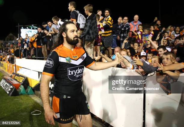 Aaron Woods of the Tigers thanks fans following the round 26 NRL match between the Wests Tigers and the New Zealand Warriors at Leichhardt Oval on...