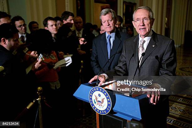 Senate Majority Leader Harry Reid and Senate Finance Chairman Max Baucus hold a news conference to discuss the economic recovery package following a...