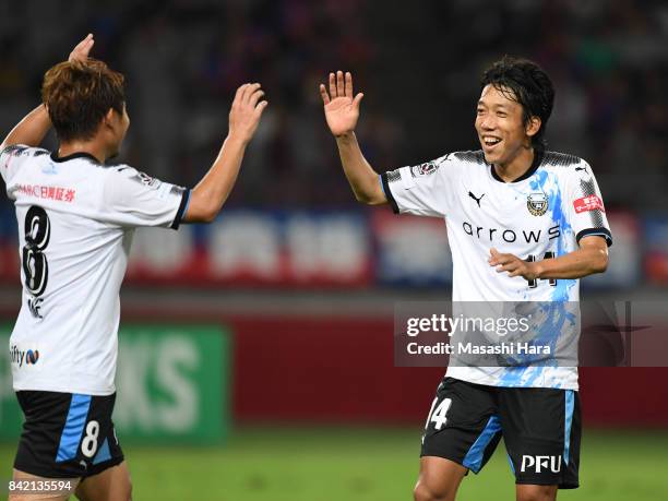 Kengo Nakamura and Hiroyuki Abe of Kawasaki Frontale celebrate the second goal during the J.League Levain Cup quarter final second leg match between...