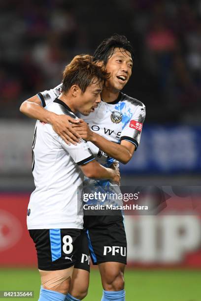 Kengo Nakamura and Hiroyuki Abe of Kawasaki Frontale celebrate the first goal during the J.League Levain Cup quarter final second leg match between...