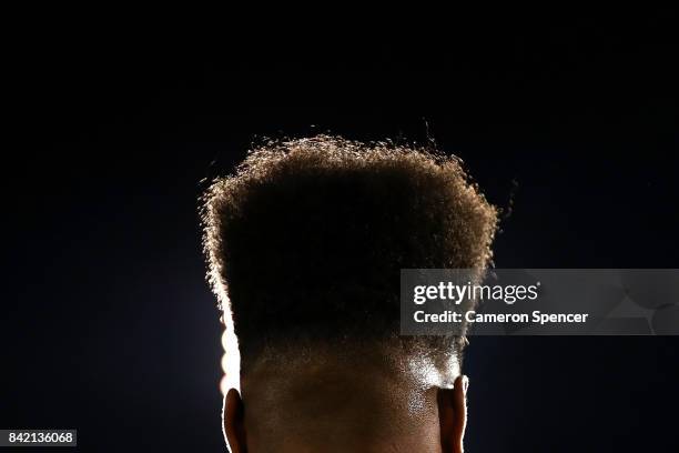 The hair of Kevin Naiqama of the Tigers is seen during the round 26 NRL match between the Wests Tigers and the New Zealand Warriors at Leichhardt...