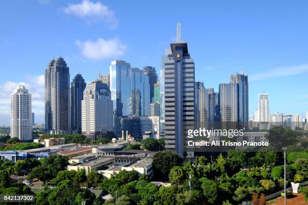 central business district of scbd, jakarta skyline. - jakarta stock pictures, royalty-free photos & images