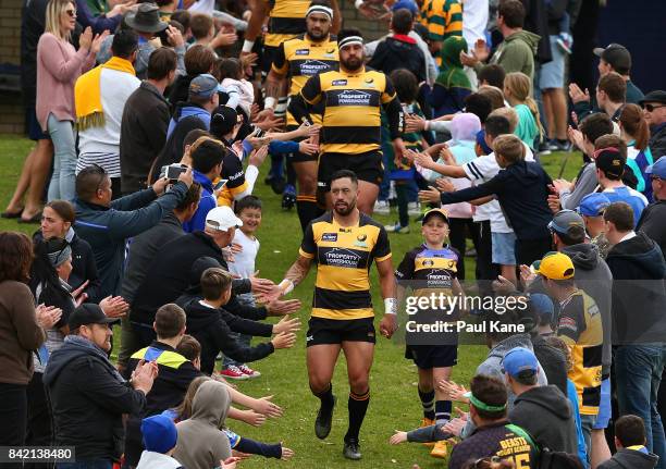 Michael Ruru of the Spirit leads the team onto the field during the round one NRC match between Perth Spirit and Melbourne Rising at McGillivray Oval...