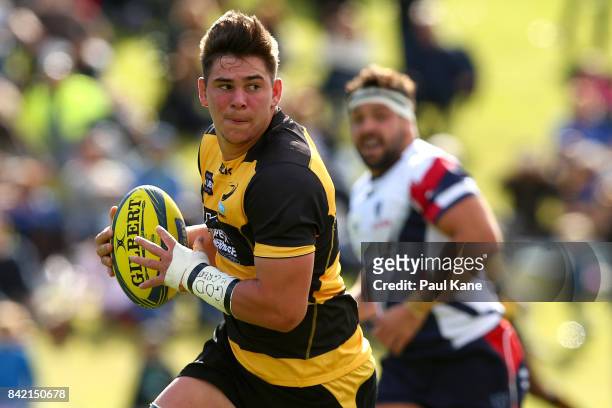 Richard Hardwick of the Spirit runs the ball during the round one NRC match between Perth Spirit and Melbourne Rising at McGillivray Oval on...