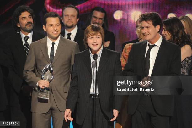 Actors Angus T. Jones, Jon Cryer, Charlie Sheen and cast members accept the Favorite TV Comedy award for "Two and a Half Men" at the 35th Annual...