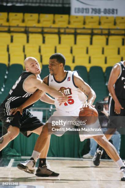 Trey Johnson of the Bakersfield Jam shields the ball from Brian Morrison of the Austin Toros at McKay Events Center during the NBA D-League Showcase...