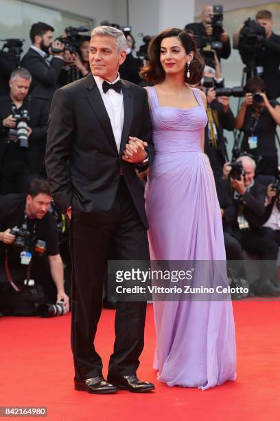 George Clooney and Amal Clooney walk the red carpet ahead of the 'Suburbicon' screening during the 74th Venice Film Festival at Sala Grande on...