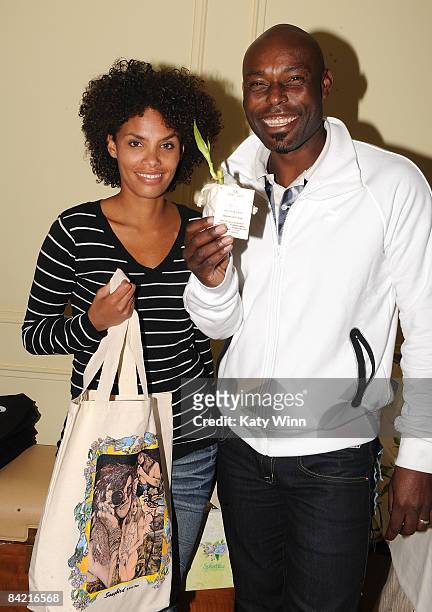 Actors Evelyn Jean-Louis and husband Jimmy Jean-Louis arrives at the Pre-Golden Globes DPA Gifting Lounge hosted by Nathalie Dubois held at the The...