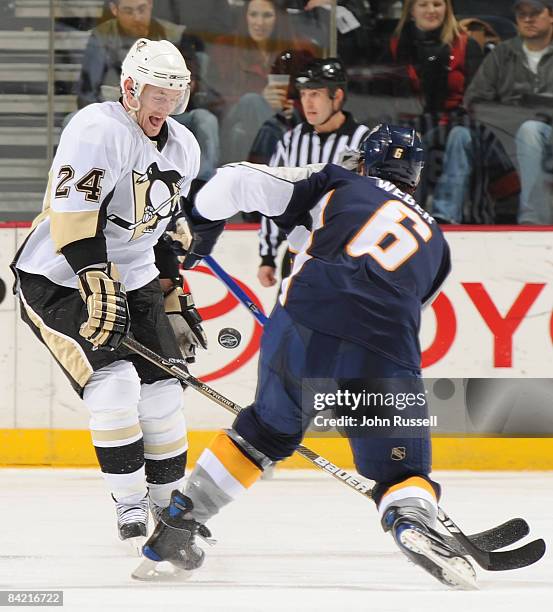 Matt Cooke of the Pittsburgh Penguins blocks the shot of Shea Weber of the Nashville Predators on January 8, 2009 at the Sommet Center in Nashville,...