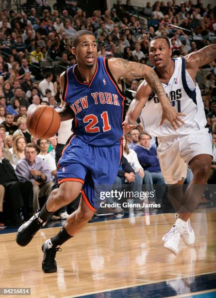 Wilson Chandler of the New York Knicks drives against Antoine Wright of the Dallas Mavericks on January 8, 2009 at the American Airlines Center in...