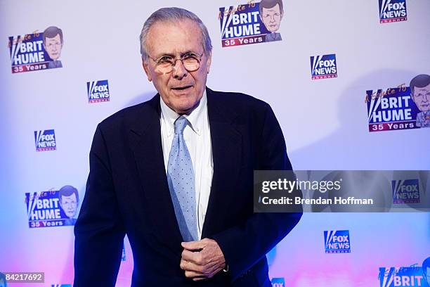 Former Secretary of Defense Donald Rumsfeld poses on the red carpet upon arrival at a salute to FOX News Channel's Brit Hume on January 8, 2009 in...