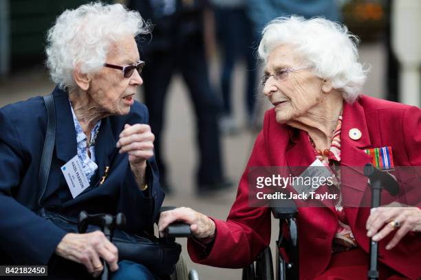 World War II veterans from the Auxiliary Territorial Service Hazel Pearson and Betty Webb talk during an annual reunion for those who worked at...