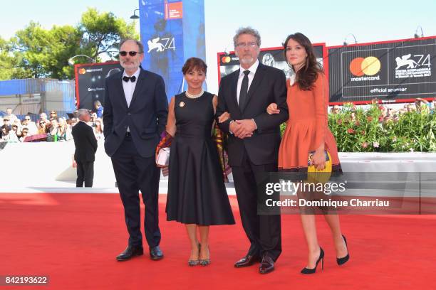 Jean-Pierre Darroussin, Ariane Ascaride, Robert Guediguian and Anais Demoustier walk the red carpet ahead of the 'The House By The Sea ' screening...