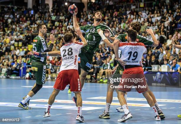 Marko Kopljar of Fuechse Berlin, Denni Djozic of the Eulen Ludwigshafen, Petar Nenadic of Fuechse Berlin and Jan Remmlinger of the Eulen Ludwigshafen...