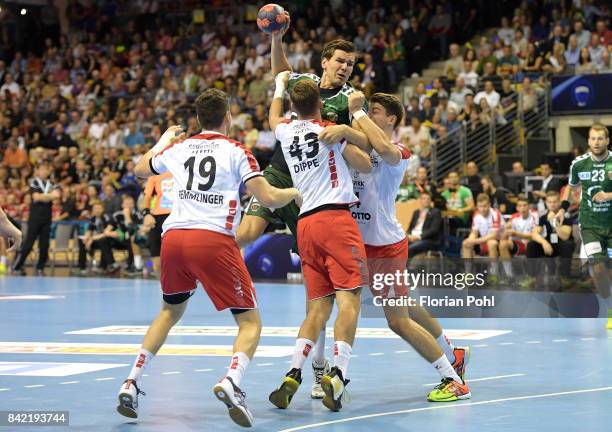 Jan Remmlinger, Kai Dippe of the Eulen Ludwigshafen and Erik Schmidt of Fuechse Berlin during the game between Fuechse Berlin and the Eulen...