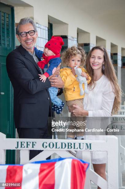 Jeff Goldblum, his sons: River Joe and Charlie Ocean, and his wife Emilie Livingston pose in front of Goldblum's dedicated beach locker room on the...