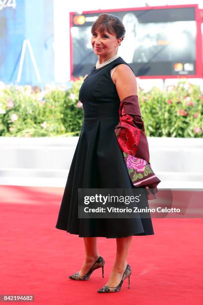 Ariane Ascaride walks the red carpet ahead of the 'The House By The Sea ' screening during the 74th Venice Film Festival at Sala Grande on September...