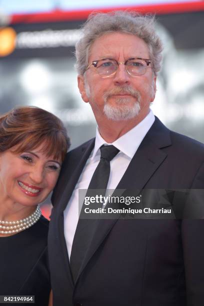 Ariane Ascaride and Robert Guediguian walk the red carpet ahead of the 'The House By The Sea ' screening during the 74th Venice Film Festival at Sala...