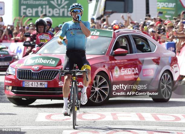 Astana Pro Team's Colombian cyclist, Miguel Angel Lopez Moreno, celebrates as he crosses the finish line winning the 15th stage of the 72nd edition...