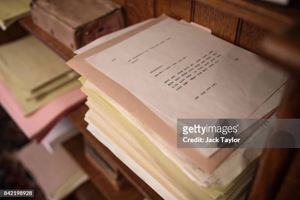 Stack of coded messages sit on a shelf in The Library in Bletchley Park Mansion, recreated to show how it looked when it was used as a Naval...
