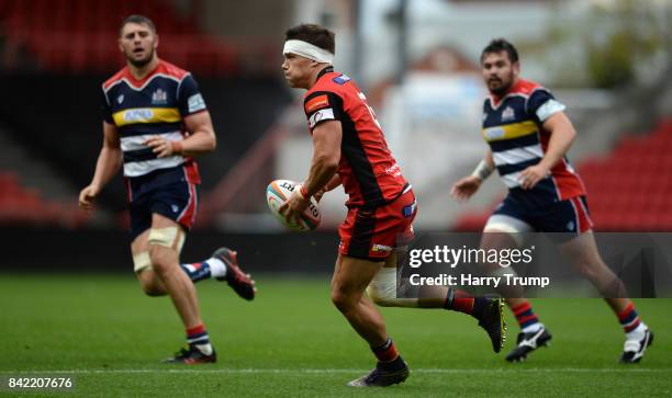 Steve Leonard of Hartpury College makes a break during the Greene King IPA Championship match between Bristol Rugby and Hartpury College at Ashton...