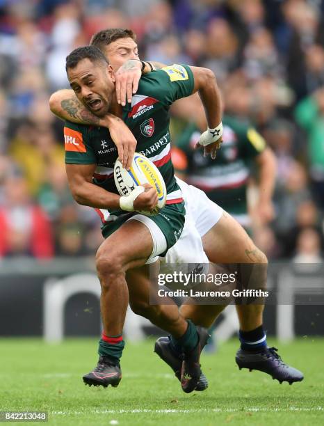 Telusa Veainu of Leicester Tigers is tackled by Matt Banahan of Bath Rugby during the Aviva Premiership match between Leicester Tigers and Bath Rugby...