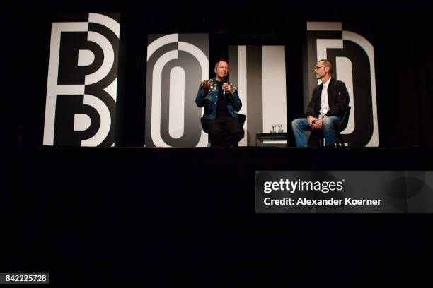Host Thierry-Maxime Loriot and designer Viktor Horsting speak at a panel talk ahead of the 'Viktor & Rolf' fashion show during Bread & Butter by...