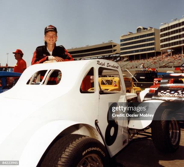 Dale Earnhardt Jr. Poses with his Legends car he drove during the 1992 racing season at Charlotte Motor Speedway in Concord, North Carolina.